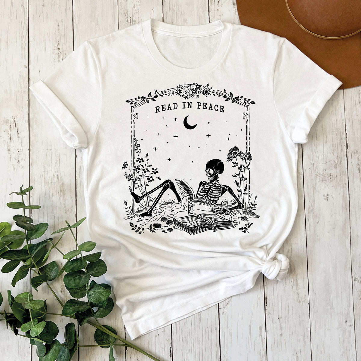 Read in Peace Shirt, Skeleton Halloween T-Shirt, Book Lover Skeleton Tee, Halloween Bookish Gift, Skeleton Reading Shirt, Spooky Season Gift
